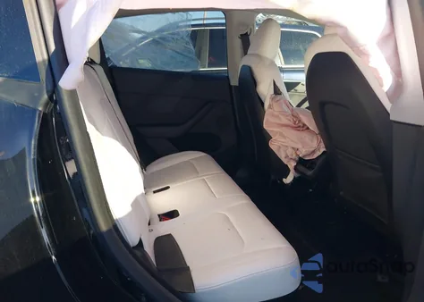 2023 Tesla Model Y from USA, damaged, VIN 7SAYGDEE2PA186128